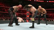 Rollins kick both Anderson and Gallows