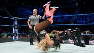 Naomi get suplex by Natalya