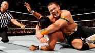 Cena traps Rollins in submission