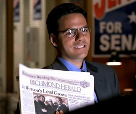 Jock Busfield holding newspaper