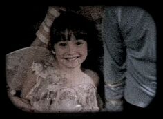 Samantha dressed as a fairy in a home movie.