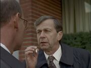 Cigarette Smoking Man discusses pouch with Walter Skinner.