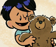 how he appeared as a young boy, shown with bear in blue shirt