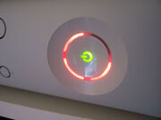 Three red lights on the Xbox 360's ring indicator representing a "General Error requiring service of the Console or Power Adapter", commonly nicknamed the "Red Ring of Death"