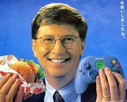 Bill Gates with a burger and a prototype of the Controller S.