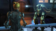 A MEC Trooper watches as a MEC is constructed in the Cybernetics Lab