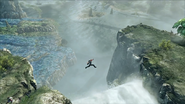 Jumping across the top of a waterfall