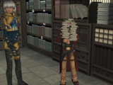 Jr. carries a large stack of books he intends to purchase.