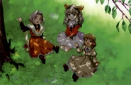 Primera, Midori, and Maria resting under a tree.