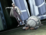 Albedo slaps Kirsch's face and throws her across the room.