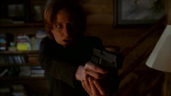 Scully Aveuglée Coup du Sort.jpg