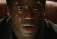 Hakeem Kae-Kazim as African Businessman