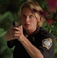 Kendall Cross as Cop #2