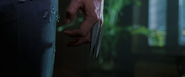 Logan retracting his claws (X2 - 2003)