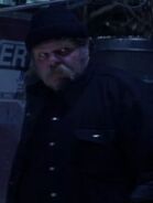 George Buza as Trucker