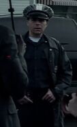 Amir Sám Nakhjavani as Cop
