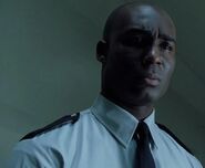 Michasha Armstrong as Plastic Prison Guard