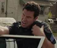 Matt Keyes as Cop