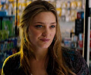 Tess Haubrich as Cashier