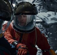Julian Bailey as Shuttle Commander