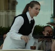 Marine Buton as French Waitress
