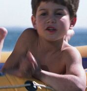 Daniel Magder as Boy on Raft
