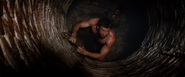 Logan climbing out of the well (Nagasaki - August 1945)