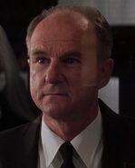 Unknown actor as Train Station Ticketing Agent