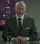 Richard Dagenais as News Anchor