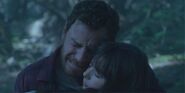 Erik mourns over Nina's dead body