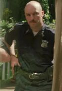 Robert Hayley as Cop