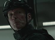 Doug Chapman as Military Train Guard