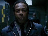 Julian D. Christopher as Prison Truck Guard #1