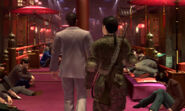 Kazuma Kiryu and Misuzu Asagi at Purgatory in Yakuza: Dead Souls