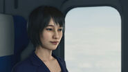 Makoto on a plane to her new life abroad.