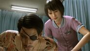 Makoto gives massage to Majima