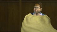 Hana wearing a blanket