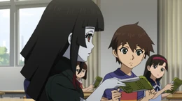 Fleur gives Tsubasa his textbook back after memorizing it in seconds
