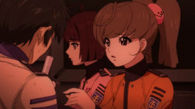Misaki helps Makoto with first aid.