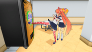 Osana kicking the vending machine.