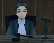 The judge with his gravel and speaker.