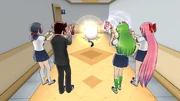 Midori playing an augmented reality game with her other club members.