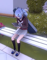 Umeko reading by the swimming pool.