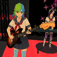 Beshi playing the bass in the Light Music Club.