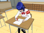 Aoi taking notes and doing her schoolwork in-game.