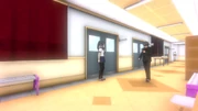 Ayano Aishi observing her Senpai from afar outside the , as seen in the .