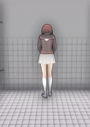 Sumire standing in the bathroom