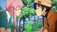 Yuno sharing a drink with Yukiteru.