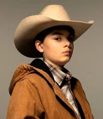 Brecken Merrill as Tate Dutton