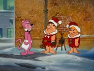 Fred and Barney dressed as Santas with Snagglepuss from Yogi Bear's All-Star Comedy Christmas Caper.